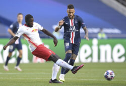 PSG's Neymar, right, challenges for the ball with Leipzig's Dayot Upamecano during the Champions League semifinal soccer match between RB Leipzig and Paris Saint-Germain at the Luz stadium in Lisbon, Portugal, Tuesday, Aug. 18, 2020. (David Ramos/Pool Photo via AP)  XVG129
