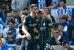 BRIGHTON, ENGLAND - MAY 12:     Aymeric Laporte (14) of Manchester City celebrates scoring a goal to make the score 1-2 and kisses the head of Riyad Mahrez (26) of Manchester City during the Premier League match between Brighton & Hove Albion and Manchester City at American Express Community Stadium on May 12, 2019 in Brighton, United Kingdom. (MB Media)