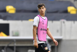 FILE - In this Sunday Aug. 9, 2020 file photo, Leverkusen's Kai Havertz looks around during a training session in Duesseldorf, Germany. Bayer Leverkusen forward Kai Havertz left the Germany national team training camp on Friday, Sept. 4 to try to complete his transfer to Chelsea. Leverkusen sports director Rudi Voeller said Havertz is traveling to London so that Kai can now sort things out on the ground in London with our support. (AP Photo/Martin Meissner, file)  LLT101