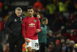 Manchester United's manager Ole Gunnar Solskjaer, left, and Manchester United's Mason Greenwood walk on the pitch at the end of the round of 32 second leg Europa League soccer match between Manchester United and Brugge at Old Trafford in Manchester, England, Thursday, Feb. 27, 2020. (AP Photo/Dave Thompson)  XDMV146