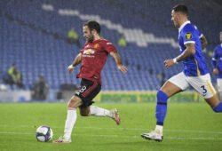 Manchester United's Juan Mata, left, scores his team's second goal as Brighton's Ben White watches during the English League Cup fourth round soccer match between Brighton and Manchester United at Falmer Stadium in Brighton, England, Wednesday, Sept. 30, 2020. (Andy Rain/Pool via AP)  XMB151