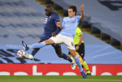 Porto's Moussa Marega, left, and Manchester City's Eric Garcia, right, vie for the ball during the Champions League group C soccer match between Manchester City and FC Porto at the Etihad stadium in Manchester, England, Wednesday, Oct. 21, 2020. (Paul Ellis/Pool via AP)  LKW120